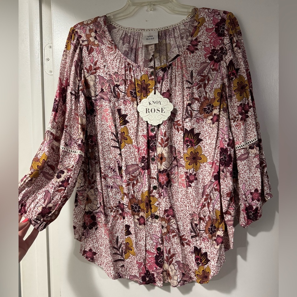 Knox Rose Pink Blouse with Ruffled Sleeves and Floral Design